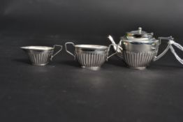 A decorative 20th century three piece si