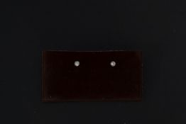A pair of white gold diamond stud earrin