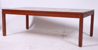A 1970's large teak and tile top rectang