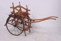 A 19th century French childs dog cart /