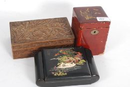 A Chinese laquered tea caddy and jewelle
