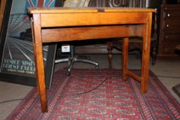 An early 20th century childs wooden twin