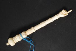 An antique style 20th century carved bon