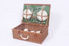 A retro 1960's picnic hamper of whicker