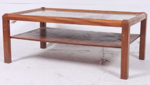 A 1970's retro teak and mirror advertisi