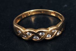 An 18k yellow gold diamond ring, 16 poin
