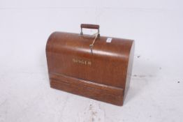 A 1930's cased singer sewing machine.  H