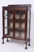 An Edwardian mahogany display cabinet. R