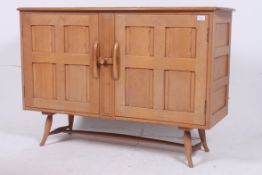 An Ercol retro 1970's sideboard raised o