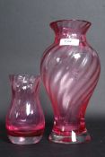 Two Caithness cranberry glass twist vase