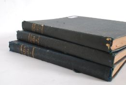 A collection of three volumes of Punch m