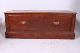 An Edwardian style mahogany end of bed c