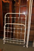 A Victorian cast metal single bed painte