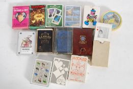 Several sets of playing cards to include