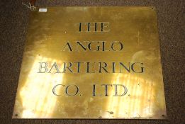 An early 20th century brass advertising