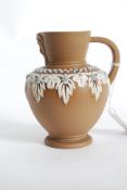 A Doulton Lambeth silicon stoneware jug.