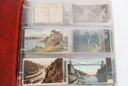 A vintage postcard album containing a co