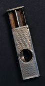 A hallmarked silver cigar cutter
