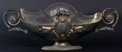 A large silver plate / white metal cut g