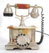 A retro onyx table telephone with ring d