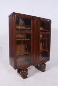 A 1930's Art Deco oak display cabinet ra