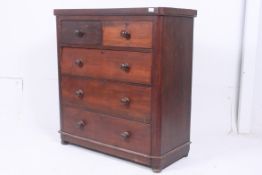 A Victorian mahogany 2 over 3 chest of d