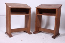 A pair of 20th century oak lecterns havi
