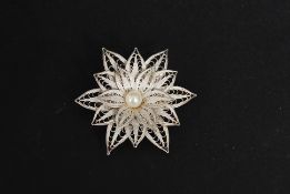A white metal ( marked Silver ) ladies b