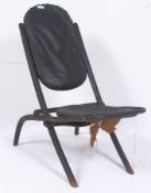 A 1930's bentwood folding chair with ori