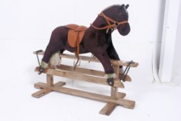 A vintage 20th century upholstered child