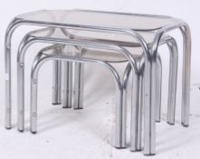 A retro 1970's chrome and smoked glass n