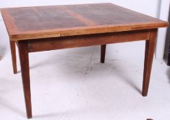 A large Edwardian oak draw leaf refector