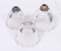 A collection of three 1930's Holophane g
