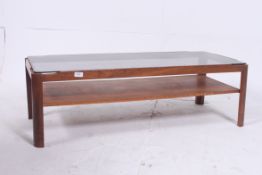 A retro 1970's teak coffee table. The lo