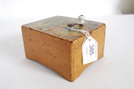 An early 20th century musical wooden box