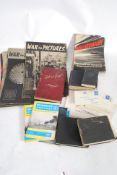 A collection of military books and magaz