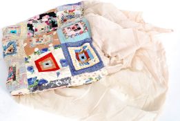 A 1950's handmade bed quilt