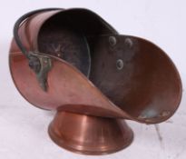 A 19th century brass copper coal scuttle
