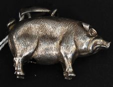 A  silver hallmarked pendant in the form