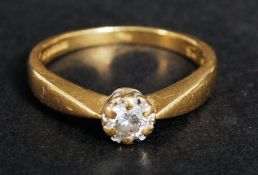 An 18k yellow gold, 25 carat single ston