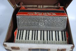 A vintage Soprani orange and cream faux