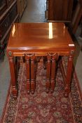 A Regency style hardwood nest of tables
