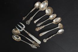 A collection of 9x silver and white meta