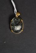 An 18ct gold ladies oversized pendant. T