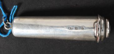 A white metal silver cigarette holder ca
