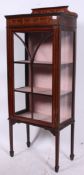 An Edwardian mahogany upright display ca