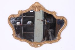 A 20th century gilt rococo wall mirror o