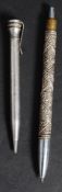 A sterling silver propelling pencil toge