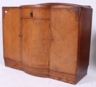 A 1930's Art Deco oak bow front sideboar