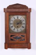An early 20th century 8 day oak cased Am
